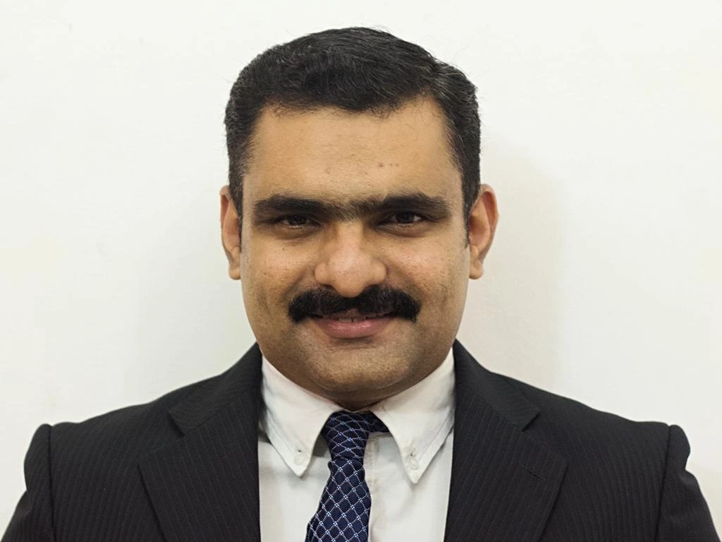Dr. ANISH PHILIP